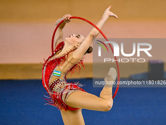 Natalya Usova of Uzbekistan competes in the Hoop final of the International Rhythmic Gymnastics Tournament ''Sky Grace 2024'' at Aspire Zone...