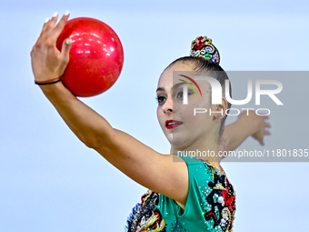 Silva Sargsyan of Armenia competes in the Ball final of the International Rhythmic Gymnastics Tournament ''Sky Grace 2024'' at Aspire Zone F...