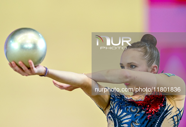 Takhmina Ikromova of Uzbekistan competes in the Ball final of the International Rhythmic Gymnastics Tournament ''Sky Grace 2024'' at Aspire...