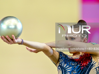 Takhmina Ikromova of Uzbekistan competes in the Ball final of the International Rhythmic Gymnastics Tournament ''Sky Grace 2024'' at Aspire...