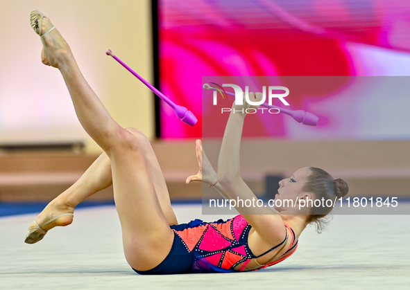 Antonia Marinova of Bulgaria competes in the Clubs final of the International Rhythmic Gymnastics Tournament ''Sky Grace 2024'' at Aspire Zo...