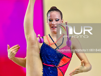 Antonia Marinova of Bulgaria competes in the Clubs final of the International Rhythmic Gymnastics Tournament ''Sky Grace 2024'' at Aspire Zo...