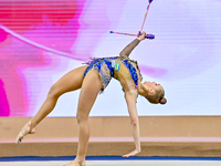 Natalya Usova of Uzbekistan competes in the Clubs final of the International Rhythmic Gymnastics Tournament ''Sky Grace 2024'' at Aspire Zon...