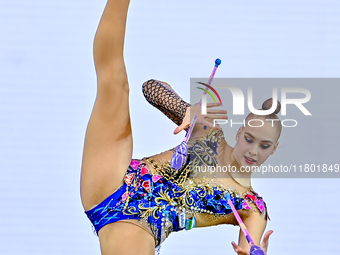 Natalya Usova of Uzbekistan competes in the Clubs final of the International Rhythmic Gymnastics Tournament ''Sky Grace 2024'' at Aspire Zon...