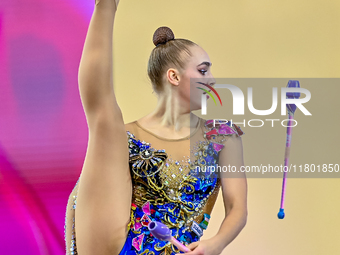 Natalya Usova of Uzbekistan competes in the Clubs final of the International Rhythmic Gymnastics Tournament ''Sky Grace 2024'' at Aspire Zon...