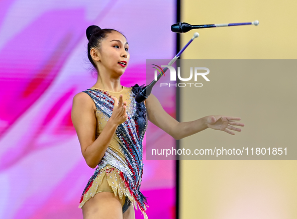 Aibota Yertaikyzy of Kazakhstan competes in the Clubs final of the International Rhythmic Gymnastics Tournament 'Sky Grace 2024' at Aspire Z...