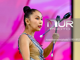 Aibota Yertaikyzy of Kazakhstan competes in the Clubs final of the International Rhythmic Gymnastics Tournament 'Sky Grace 2024' at Aspire Z...