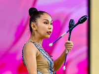 Aibota Yertaikyzy of Kazakhstan competes in the Clubs final of the International Rhythmic Gymnastics Tournament 'Sky Grace 2024' at Aspire Z...