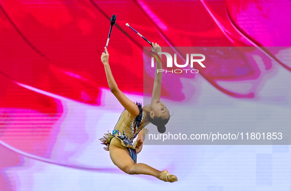 Aibota Yertaikyzy of Kazakhstan competes in the Clubs final of the International Rhythmic Gymnastics Tournament 'Sky Grace 2024' at Aspire Z...