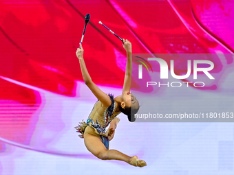 Aibota Yertaikyzy of Kazakhstan competes in the Clubs final of the International Rhythmic Gymnastics Tournament 'Sky Grace 2024' at Aspire Z...