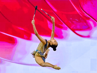 Aibota Yertaikyzy of Kazakhstan competes in the Clubs final of the International Rhythmic Gymnastics Tournament 'Sky Grace 2024' at Aspire Z...