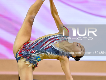 Aibota Yertaikyzy of Kazakhstan competes in the Clubs final of the International Rhythmic Gymnastics Tournament 'Sky Grace 2024' at Aspire Z...