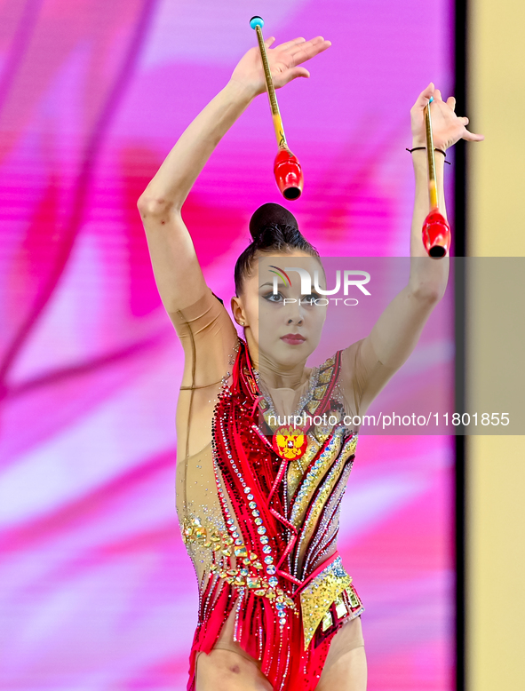 Mariia Borisova of Russia competes in the Clubs final of the International Rhythmic Gymnastics Tournament 'Sky Grace 2024' at Aspire Zone Fo...