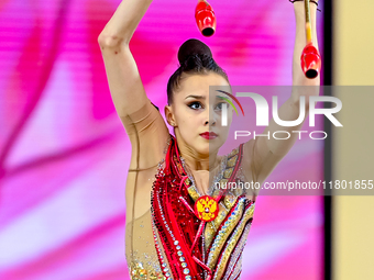 Mariia Borisova of Russia competes in the Clubs final of the International Rhythmic Gymnastics Tournament 'Sky Grace 2024' at Aspire Zone Fo...