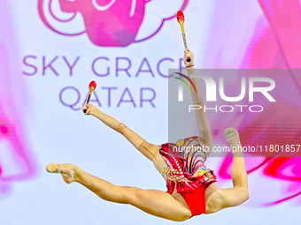 Mariia Borisova of Russia competes in the Clubs final of the International Rhythmic Gymnastics Tournament 'Sky Grace 2024' at Aspire Zone Fo...