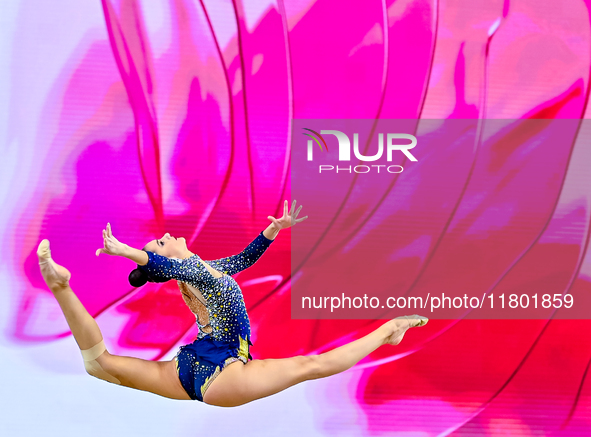 Alina Harnasko of Belarus competes in the Clubs final of the International Rhythmic Gymnastics Tournament 'Sky Grace 2024' at Aspire Zone Fo...