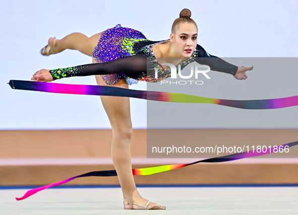 Natalya Usova of Uzbekistan competes in the Ribbon final of the International Rhythmic Gymnastics Tournament ''Sky Grace 2024'' at Aspire Zo...