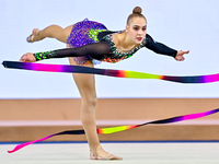 Natalya Usova of Uzbekistan competes in the Ribbon final of the International Rhythmic Gymnastics Tournament ''Sky Grace 2024'' at Aspire Zo...