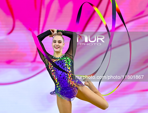 Natalya Usova of Uzbekistan competes in the Ribbon final of the International Rhythmic Gymnastics Tournament ''Sky Grace 2024'' at Aspire Zo...