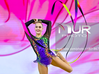 Natalya Usova of Uzbekistan competes in the Ribbon final of the International Rhythmic Gymnastics Tournament ''Sky Grace 2024'' at Aspire Zo...