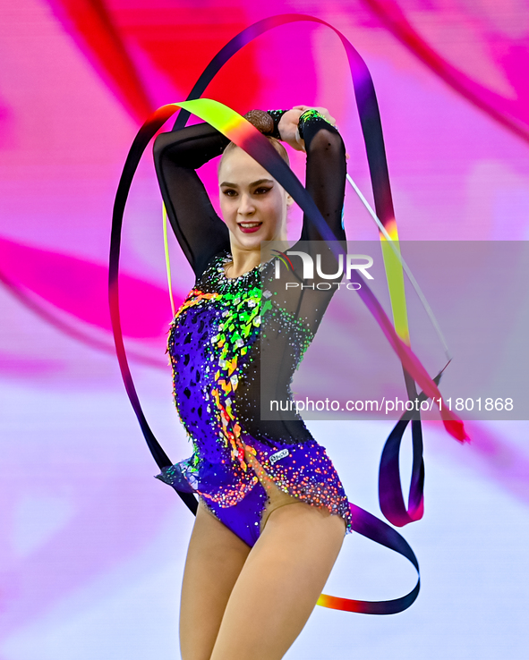 Natalya Usova of Uzbekistan competes in the Ribbon final of the International Rhythmic Gymnastics Tournament ''Sky Grace 2024'' at Aspire Zo...