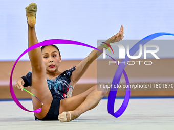 Aibota Yertaikyzy of Kazakhstan competes in the Ribbon final of the International Rhythmic Gymnastics Tournament ''Sky Grace 2024'' at Aspir...