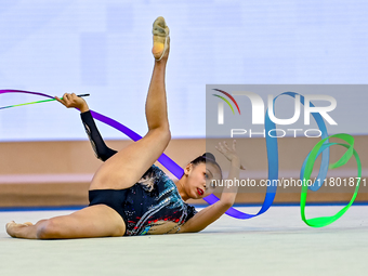 Aibota Yertaikyzy of Kazakhstan competes in the Ribbon final of the International Rhythmic Gymnastics Tournament ''Sky Grace 2024'' at Aspir...