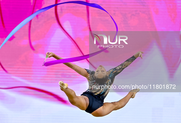 Aibota Yertaikyzy of Kazakhstan competes in the Ribbon final of the International Rhythmic Gymnastics Tournament ''Sky Grace 2024'' at Aspir...