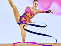 Daria Grokhotova of Belarus competes in the Ribbon final of the International Rhythmic Gymnastics Tournament ''Sky Grace 2024'' at Aspire Zo...