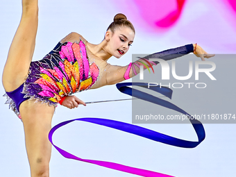 Daria Grokhotova of Belarus competes in the Ribbon final of the International Rhythmic Gymnastics Tournament ''Sky Grace 2024'' at Aspire Zo...