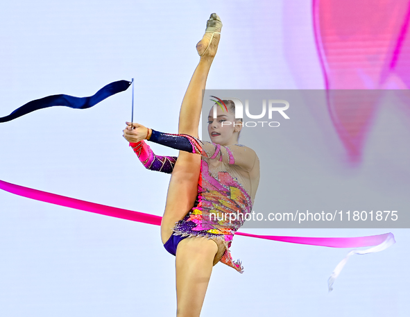 Daria Grokhotova of Belarus competes in the Ribbon final of the International Rhythmic Gymnastics Tournament ''Sky Grace 2024'' at Aspire Zo...