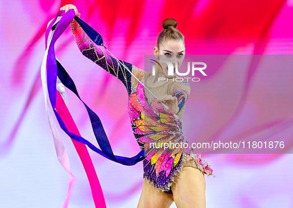 Daria Grokhotova of Belarus competes in the Ribbon final of the International Rhythmic Gymnastics Tournament ''Sky Grace 2024'' at Aspire Zo...