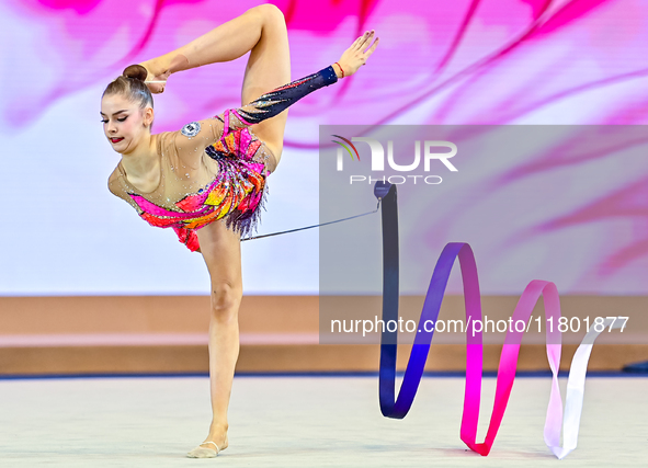 Daria Grokhotova of Belarus competes in the Ribbon final of the International Rhythmic Gymnastics Tournament ''Sky Grace 2024'' at Aspire Zo...