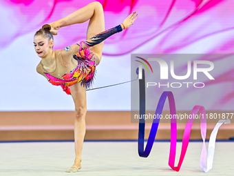 Daria Grokhotova of Belarus competes in the Ribbon final of the International Rhythmic Gymnastics Tournament ''Sky Grace 2024'' at Aspire Zo...