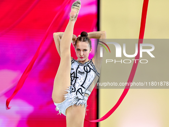 Takhmina Ikromova of Uzbekistan competes in the Ribbon final of the International Rhythmic Gymnastics Tournament 'Sky Grace 2024' at Aspire...