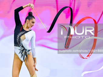 Alina Harnasko of Belarus competes in the Ribbon final of the International Rhythmic Gymnastics Tournament ''Sky Grace 2024'' at Aspire Zone...