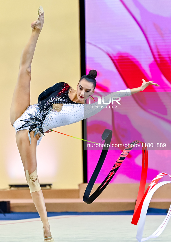 Alina Harnasko of Belarus competes in the Ribbon final of the International Rhythmic Gymnastics Tournament ''Sky Grace 2024'' at Aspire Zone...