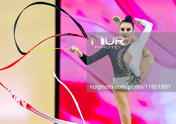 Alina Harnasko of Belarus competes in the Ribbon final of the International Rhythmic Gymnastics Tournament ''Sky Grace 2024'' at Aspire Zone...