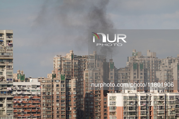 A fire breaks out in a residential area in Shanghai, China, on November 23, 2024. 