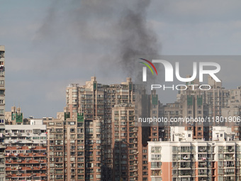 A fire breaks out in a residential area in Shanghai, China, on November 23, 2024. (