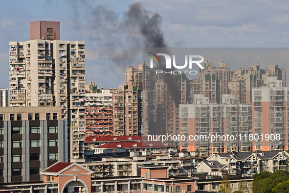 A fire breaks out in a residential area in Shanghai, China, on November 23, 2024. 