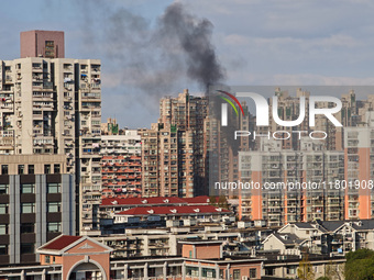 A fire breaks out in a residential area in Shanghai, China, on November 23, 2024. (