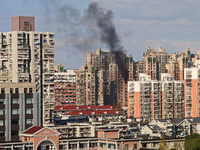 A fire breaks out in a residential area in Shanghai, China, on November 23, 2024. (