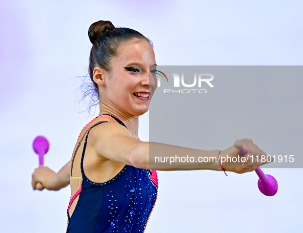 Antonia Marinova of Bulgaria competes in the Clubs final of the International Rhythmic Gymnastics Tournament ''Sky Grace 2024'' at Aspire Zo...