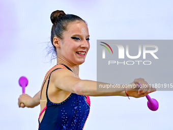 Antonia Marinova of Bulgaria competes in the Clubs final of the International Rhythmic Gymnastics Tournament ''Sky Grace 2024'' at Aspire Zo...