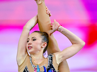 Takhmina Ikromova of Uzbekistan competes in the Clubs final of the International Rhythmic Gymnastics Tournament ''Sky Grace 2024'' at Aspire...