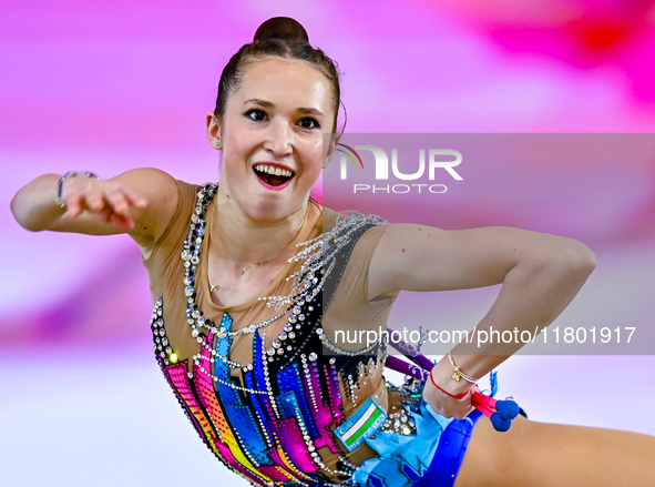 Takhmina Ikromova of Uzbekistan competes in the Clubs final of the International Rhythmic Gymnastics Tournament ''Sky Grace 2024'' at Aspire...