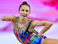 Takhmina Ikromova of Uzbekistan competes in the Clubs final of the International Rhythmic Gymnastics Tournament ''Sky Grace 2024'' at Aspire...