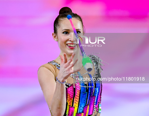 Takhmina Ikromova of Uzbekistan competes in the Clubs final of the International Rhythmic Gymnastics Tournament ''Sky Grace 2024'' at Aspire...