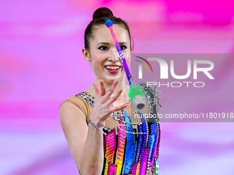 Takhmina Ikromova of Uzbekistan competes in the Clubs final of the International Rhythmic Gymnastics Tournament ''Sky Grace 2024'' at Aspire...